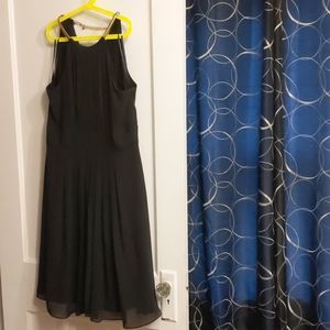 Black cocktail dress with gold embellishments